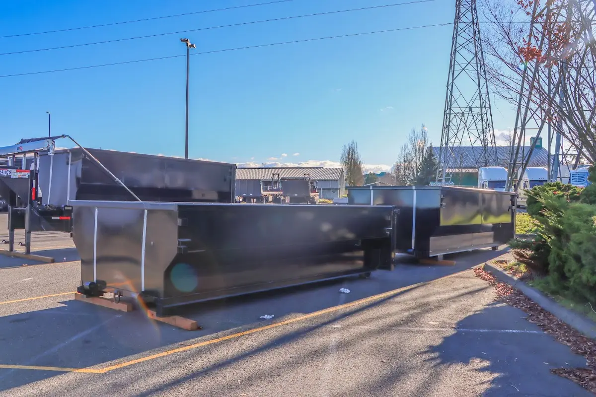 Roll-off dumpster ready for waste disposal at job site for 2 Yard Dumpster Rental in Robeson